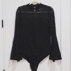 Torrid black bell sleeve bodysuit